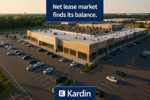 A high-resolution aerial photograph of a modern suburban retail and industrial area at golden hour, showing neatly arranged parking lots and commercial buildings. The image conveys balance and stability, reflecting the resilience of the net lease market.