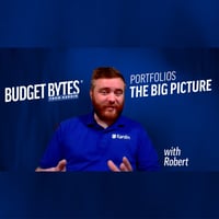 Budget Bytes from Kardin video thumbnail. Presenter Robert, wearing a blue Kardin polo shirt, introduces "Portfolios: The Big Picture."